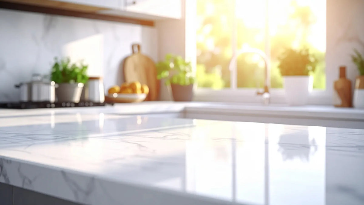 Shiny kitchen countertop after cleaning with natural sunlight and modern kitchen setup