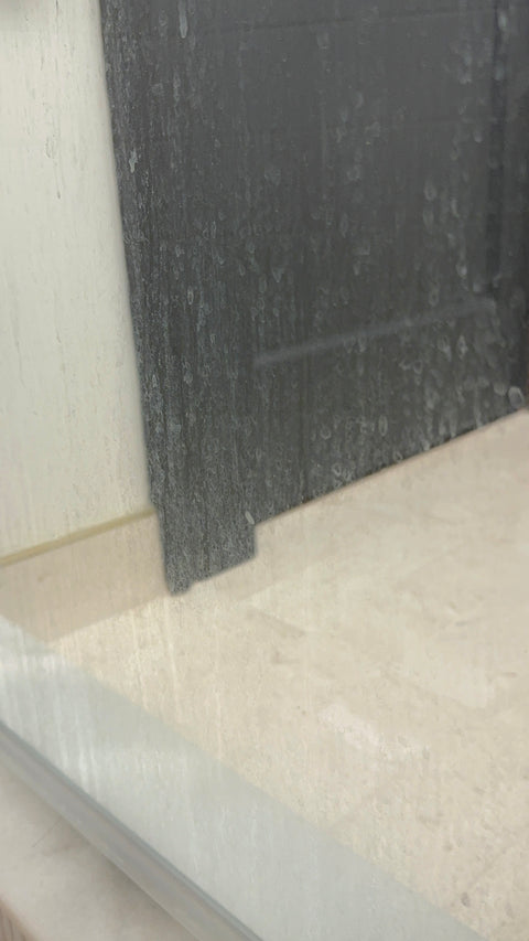 Streaky glass shower panel