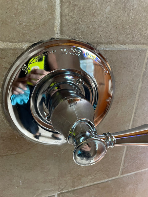 Chrome shower handle shining